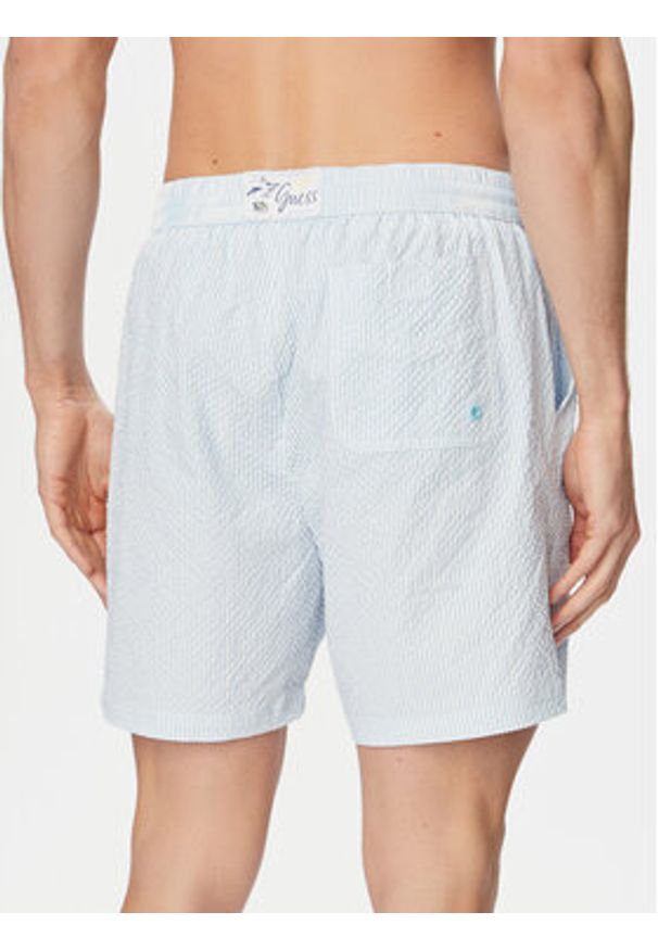 Guess Szorty kąpielowe F6GT11 WN342 Niebieski jasny Regular Fit. Kolor: niebieski. Materiał: syntetyk