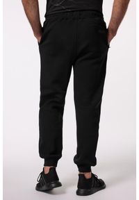 JAY-PI - Męskie Spodnie dresowe belly fit nowoczesny krój do 7 XL. Kolekcja: plus size. Kolor: czarny. Materiał: bawełna, elastan, poliester, materiał. Długość: długie