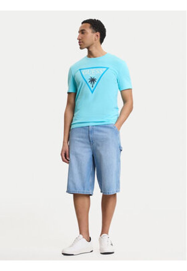Guess T-Shirt F6GI09 J1314 Niebieski Slim Fit. Kolor: niebieski. Materiał: bawełna