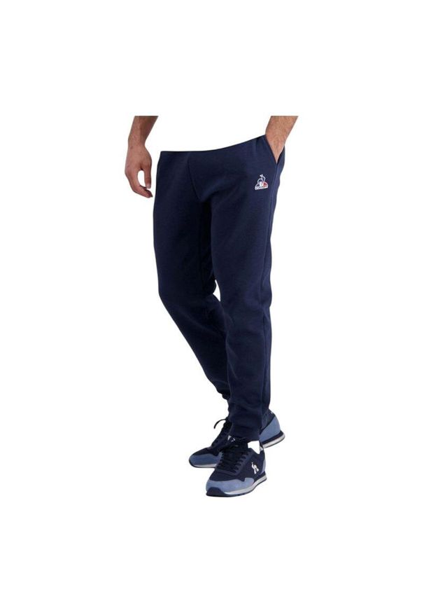 Le Coq Sportif - Baskets Homme ESS PANT REGULAR N°1 M-2423181 Bleu. Kolor: niebieski. Materiał: dresówka