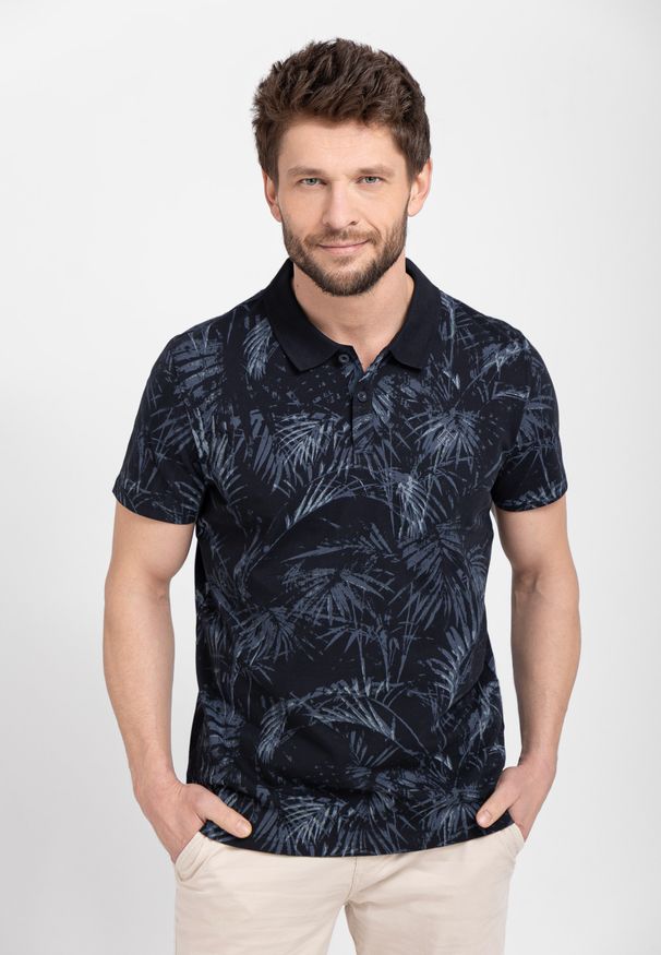 Volcano - Polówka męska z wzorem O-RAW. Typ kołnierza: polo. Kolor: niebieski. Materiał: prążkowany, bawełna, materiał, włókno, dzianina. Wzór: nadruk. Styl: klasyczny