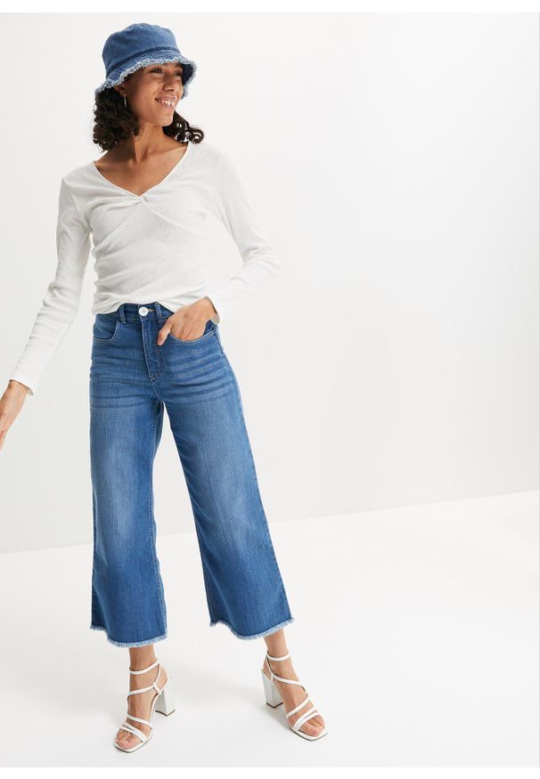bonprix - Jeansy 7/8 wide fit. Kolor: niebieski