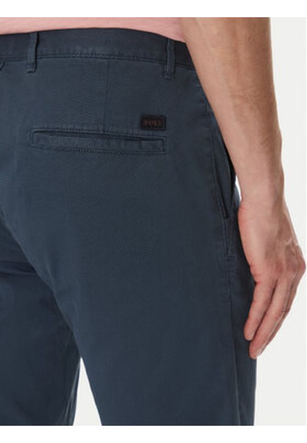 BOSS Chinosy 50536840 Niebieski Slim Fit. Kolor: niebieski. Materiał: bawełna