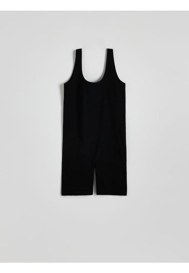 Reserved - Dopasowany kombinezon - czarny. Kolor: czarny. Materiał: dzianina. Wzór: gładki. Typ sukienki: dopasowane