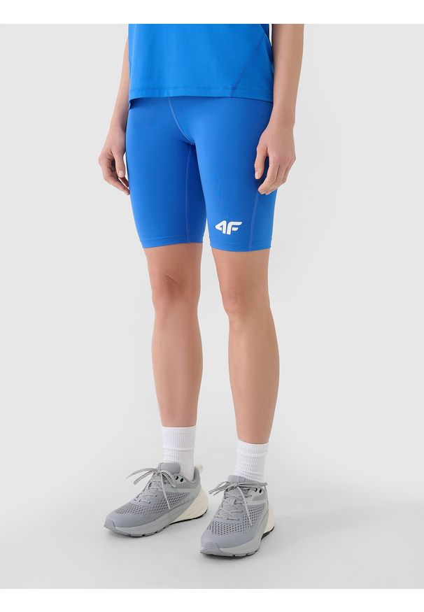 4f - 4F Legginsy kolarki treningowe damskie - niebieskie XS. Kolor: niebieski. Materiał: dzianina, elastan, włókno, syntetyk, materiał. Wzór: gładki, jednolity, ze splotem. Sport: fitness