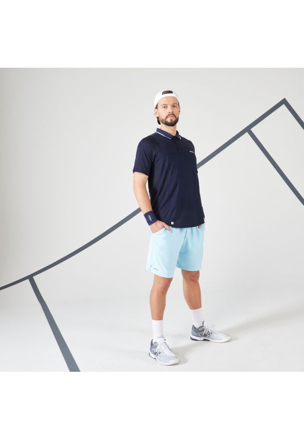 ARTENGO - Koszulka polo do tenisa z krótkim rękawem męska Artengo TPO DRY. Typ kołnierza: polo. Kolor: niebieski. Materiał: elastan, poliester, materiał. Długość rękawa: krótki rękaw. Długość: krótkie. Sport: tenis