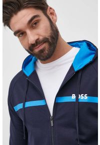 BOSS - Boss bluza bawełniana 50465773 męska kolor granatowy z kapturem melanżowa. Okazja: na co dzień. Typ kołnierza: kaptur. Kolor: niebieski. Materiał: bawełna. Długość rękawa: raglanowy rękaw. Wzór: melanż. Styl: casual #5