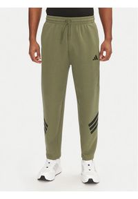 Adidas - adidas Spodnie dresowe Future Icons 3-Stripes JD4891 Zielony Loose Fit. Kolor: zielony. Materiał: bawełna, syntetyk #1