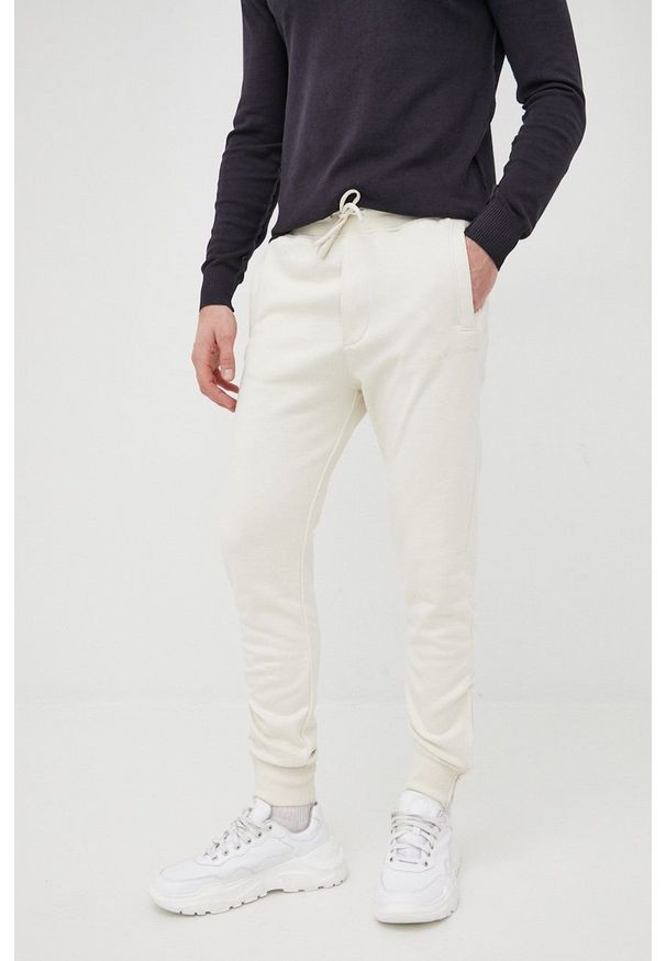Tom Tailor spodnie męskie kolor beżowy. Kolor: beżowy. Materiał: włókno, dzianina, materiał