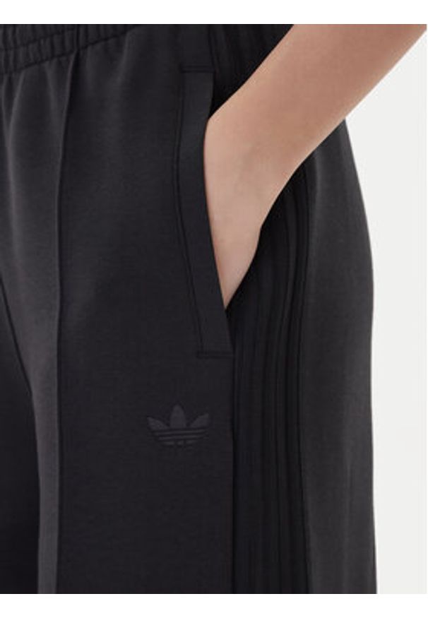 Adidas - adidas Spodnie dresowe adicolor Spacer 3-Stripes JV7500 Czarny Wide Leg. Kolor: czarny. Materiał: syntetyk, bawełna. Sport: turystyka piesza