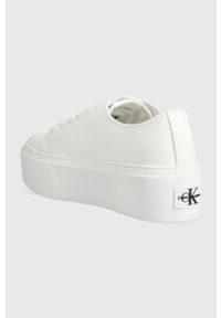 Calvin Klein Jeans tenisówki FLATFORM+ CUPSOLE LOW TXT damskie kolor biały YW0YW01033. Kolor: biały. Materiał: materiał, włókno, guma. Obcas: na platformie #4