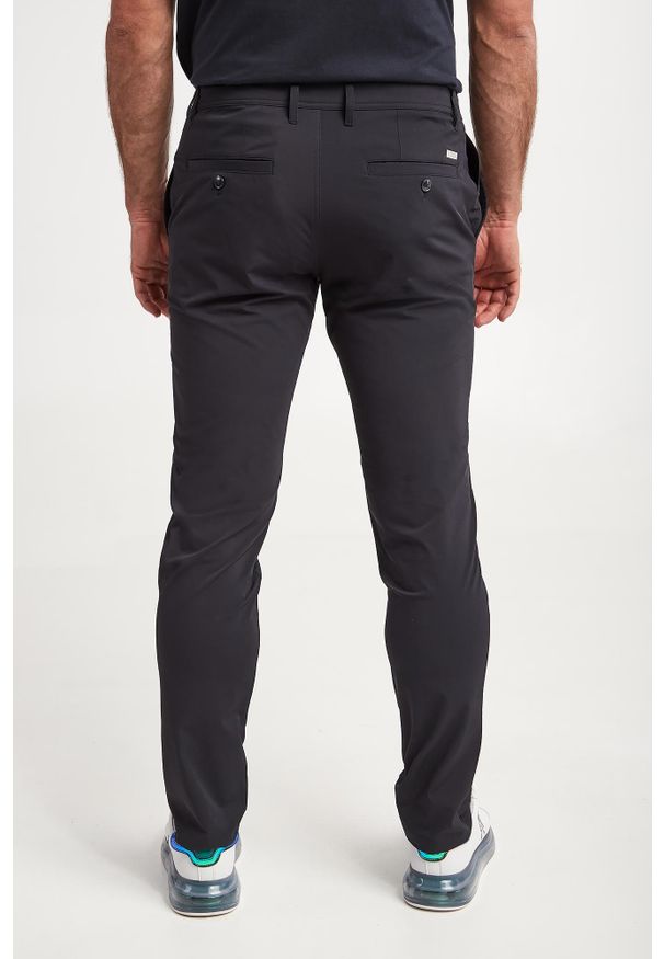 Armani Exchange - Spodnie męskie ARMANI EXCHANGE. Materiał: materiał. Wzór: aplikacja