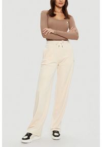 Guess - GUESS Brązowy damski longsleeve Colette. Kolor: brązowy. Długość rękawa: długi rękaw