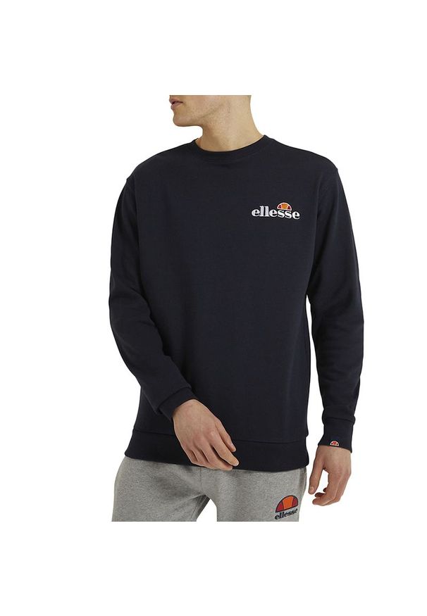 Bluza Ellesse Fierro Crew SHS08784429 - granatowa. Typ kołnierza: bez kaptura. Kolor: niebieski. Materiał: poliester, bawełna, tkanina. Wzór: aplikacja. Styl: klasyczny