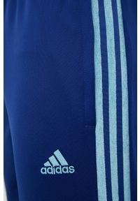 Adidas - adidas spodnie treningowe Tiro męskie kolor niebieski z aplikacją. Kolor: niebieski. Materiał: materiał, dzianina, skóra. Wzór: aplikacja. Sport: fitness #4