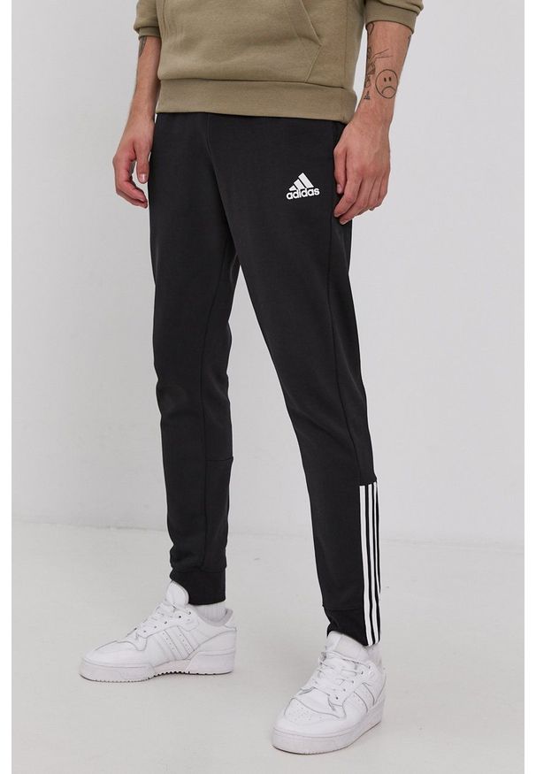 Adidas - adidas - Spodnie. Kolor: czarny. Materiał: bawełna, poliester