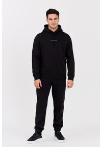 Calvin Klein - CALVIN KLEIN Czarne męskie spodnie dresowe, Rozmiar S. Kolor: czarny. Materiał: dresówka. Wzór: haft #3