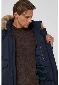 TOMMY HILFIGER - Tommy Hilfiger Kurtka puchowa męska kolor granatowy zimowa. Kolor: niebieski. Materiał: puch. Sezon: zima #2