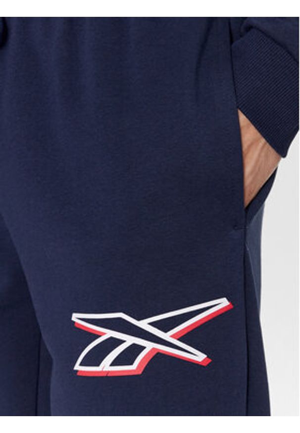 Reebok Spodnie dresowe Identity IN1685 Granatowy Regular Fit. Kolor: niebieski. Materiał: bawełna, syntetyk