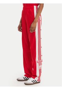 Adidas - adidas Spodnie dresowe Adibreak KD6324 Czerwony Loose Fit. Kolor: czerwony. Materiał: syntetyk #1