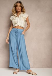 Renee - Niebieskie Spodnie Typu Palazzo o Szerokim Kroju High Waist Ozdobione Wiązaniem Yaslevia. Okazja: na co dzień. Stan: podwyższony. Kolor: niebieski. Wzór: aplikacja. Styl: casual, elegancki