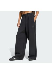 Adidas - Spodnie Soft Lux Straight Leg. Kolor: czarny. Materiał: materiał. Sport: fitness #1