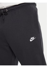 Nike Spodnie dresowe Club Fleece FN3801 Czarny Regular Fit. Kolor: czarny. Materiał: bawełna #2