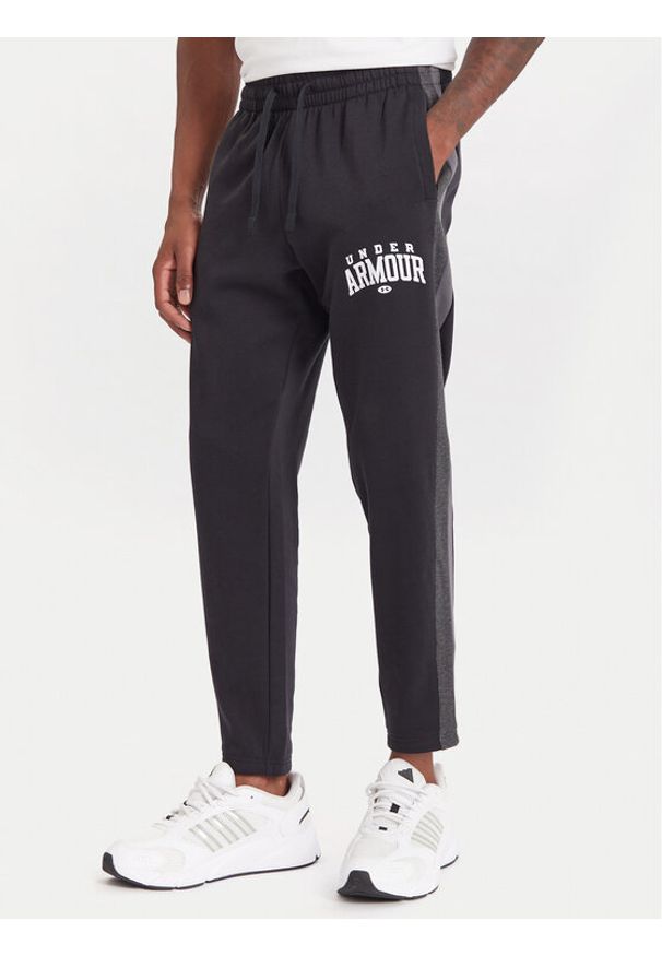 Under Armour Spodnie dresowe Ua Rival Fleece Colorblock 6003954 Czarny Loose Fit. Kolor: czarny. Materiał: bawełna