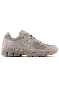 Buty unisex New Balance U2002RP – beżowe. Kolor: beżowy. Materiał: zamsz, guma. Szerokość cholewki: normalna #1