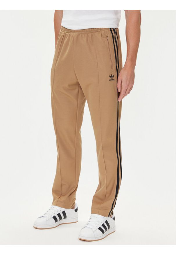 Adidas - adidas Spodnie dresowe adicolor Classics Beckenbauer JY1276 Beżowy Slim Fit. Kolor: beżowy. Materiał: bawełna, syntetyk