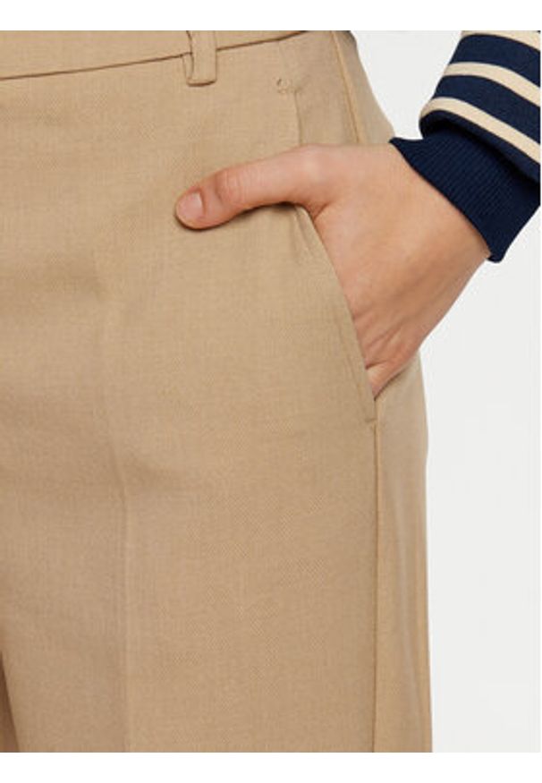 TOMMY HILFIGER - Tommy Hilfiger Chinosy WW0WW44090 Beżowy Regular Fit. Kolor: beżowy. Materiał: syntetyk