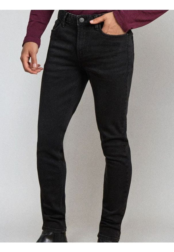 Sinsay - Spodnie jeansowe super skinny - czarny. Kolor: czarny