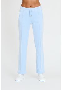 Juicy Couture - JUICY COUTURE Błękitne spodnie Tina Track Pants. Kolor: niebieski. Materiał: dresówka #1
