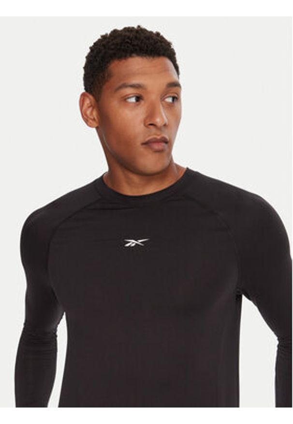 Reebok Koszulka techniczna Ls Muscle Tee RK25176CCM Czarny Regular Fit. Kolor: czarny. Materiał: syntetyk