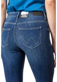 Wrangler - WRANGLER SUPER SKINNY SUMMER SKY W29JGT12W. Długość: długie. Wzór: aplikacja, ażurowy. Sezon: lato. Styl: sportowy, klasyczny