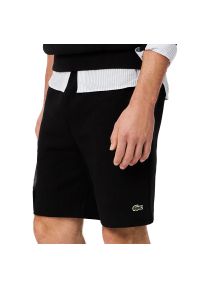 Spodenki męskie Lacoste GH9627-031 - czarne. Kolor: czarny. Materiał: bawełna, poliester. Długość: do kolan. Sport: fitness