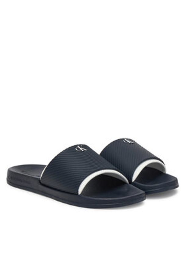 Calvin Klein Jeans Klapki Slide Rubber Neoprene Text YM0YM01234 Granatowy. Kolor: niebieski