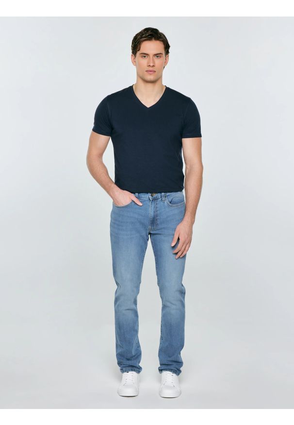 Big-Star - Jeansy męskie z przetarciami niebieskie Terry Carrot 133. Okazja: na co dzień. Stan: obniżony. Kolor: niebieski. Styl: casual