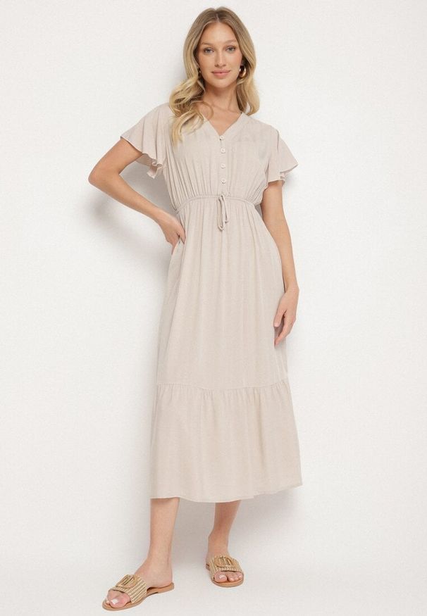Born2be - Beżowa Bawełniana Sukienka o Rozkloszowanym Kroju z Wiązaniem w Talii Folarina. Okazja: na co dzień, na spacer. Typ kołnierza: dekolt w serek. Kolor: beżowy. Materiał: bawełna. Długość rękawa: krótki rękaw. Typ sukienki: rozkloszowane. Styl: casual, elegancki