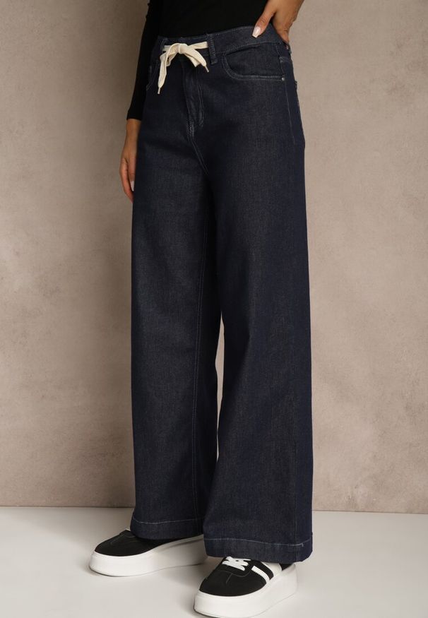 Renee - Niebieskie Jeansy z Bawełny High Waist z Ozdobną Sznurówką w Pasie Ohirvyra. Okazja: na co dzień. Stan: podwyższony. Kolor: niebieski. Styl: casual