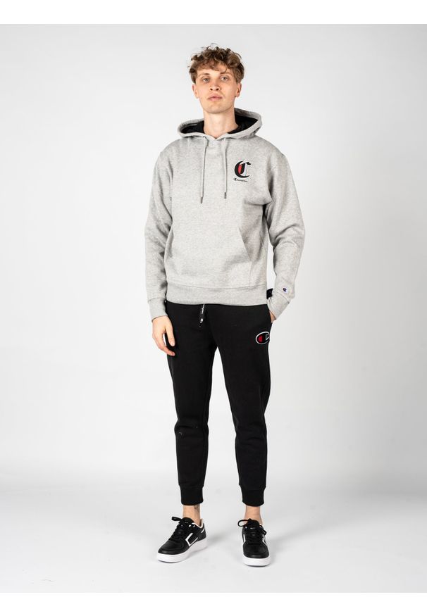 Champion Bluza "Hoodie" | HBGF89H586NKA | Mężczyzna | Szary. Okazja: na co dzień. Typ kołnierza: kaptur. Kolor: szary. Materiał: bawełna, poliester. Wzór: nadruk, aplikacja. Styl: casual