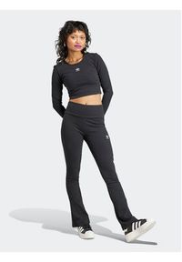 Adidas - adidas Spodnie materiałowe Essentials II8056 Czarny Flare Fit. Kolor: czarny. Materiał: bawełna #5