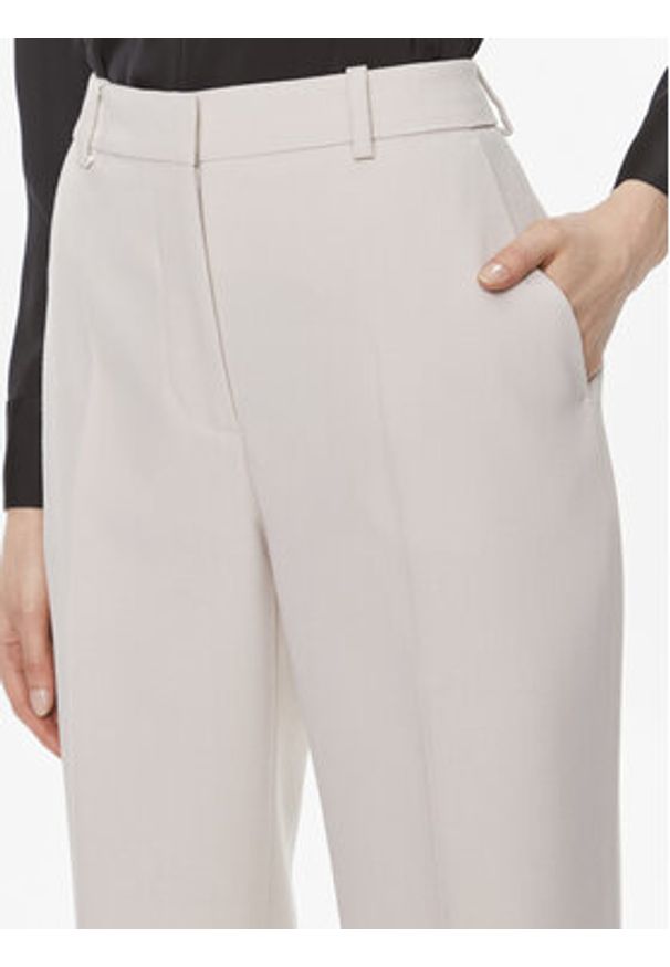 Calvin Klein Spodnie materiałowe Essential K20K206879 Szary Slim Fit. Kolor: szary. Materiał: wiskoza