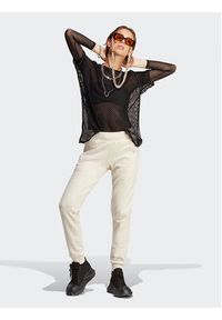 Adidas - adidas Spodnie dresowe adicolor Essentials IA6477 Beżowy Slim Fit. Kolor: beżowy. Materiał: bawełna #4