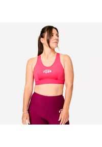 Stanik sportowy Decathlon edycja limitowana "Bougeons en rose". Kolor: różowy. Materiał: skóra, materiał, elastan. Sport: joga i pilates #1