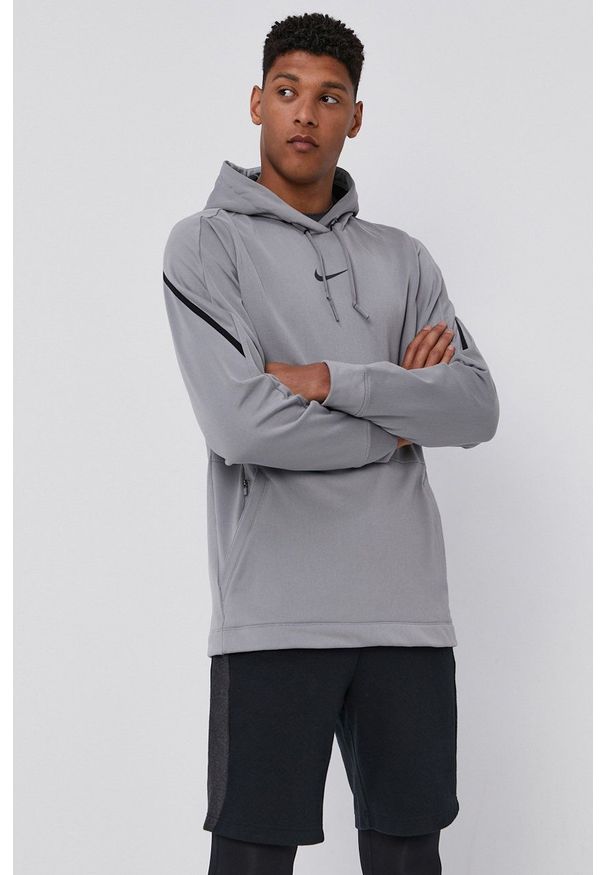 Nike Bluza męska kolor szary z kapturem gładka. Typ kołnierza: kaptur. Kolor: szary. Materiał: włókno, tkanina, skóra. Wzór: gładki