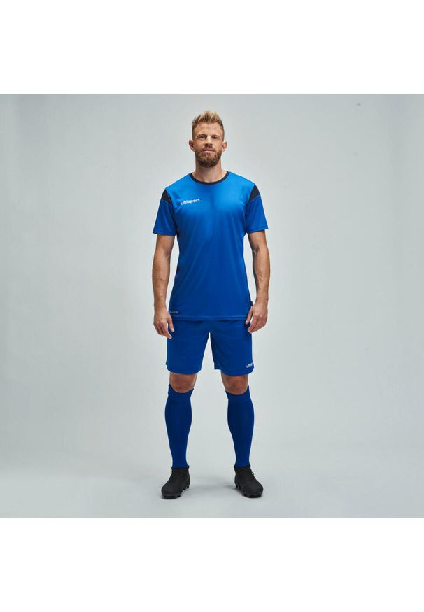 UHLSPORT - Koszulka dla dzieci Uhlsport Squad 27. Kolor: niebieski. Wzór: napisy. Sport: piłka nożna