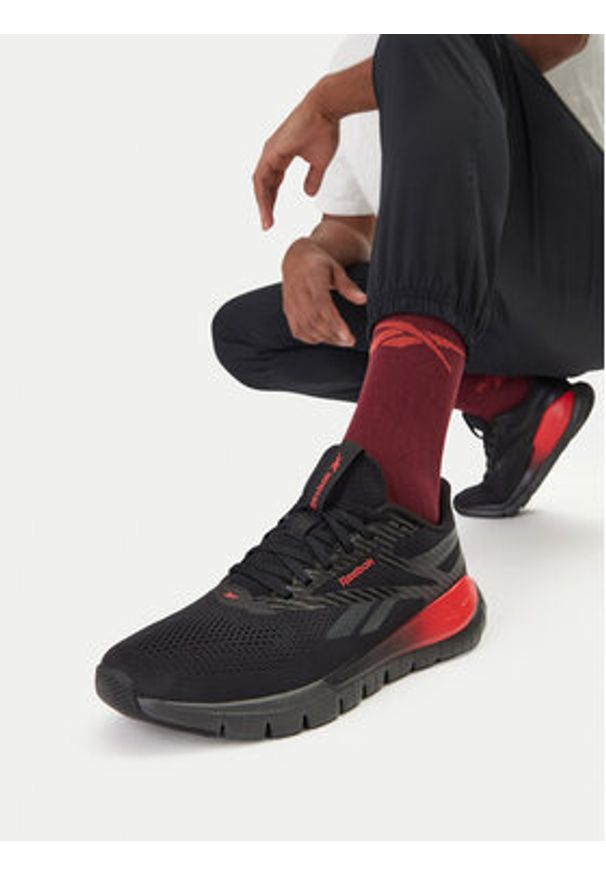 Reebok Buty na siłownię EO-FLEX TRAINER 100244444 Czarny. Kolor: czarny. Materiał: materiał. Sport: fitness