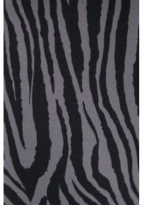 Puma legginsy damskie kolor czarny wzorzyste. Kolor: czarny. Materiał: dzianina