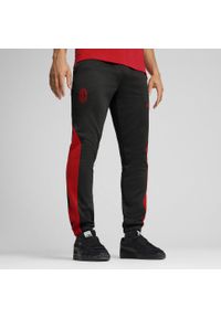 Puma - Męskie spodnie AC Milan ftblNRGY+ PUMA Black For All Time Red. Kolor: czerwony, wielokolorowy, czarny. Wzór: aplikacja. Sport: piłka nożna